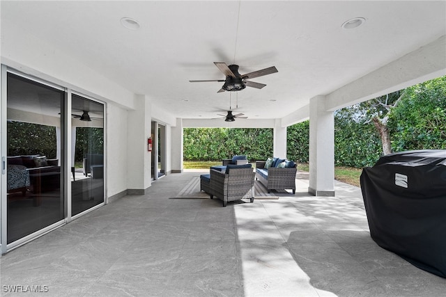 view of patio / terrace featuring an outdoor living space, a grill, and ceiling fan