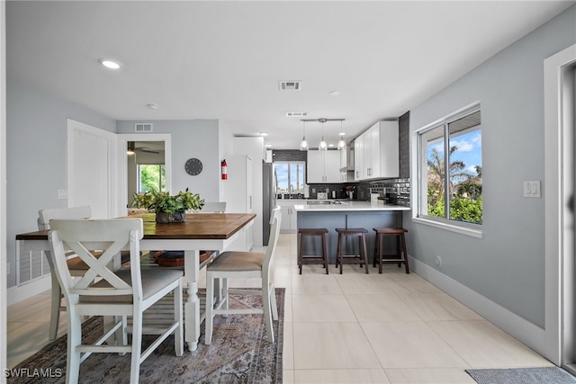 view of tiled dining space