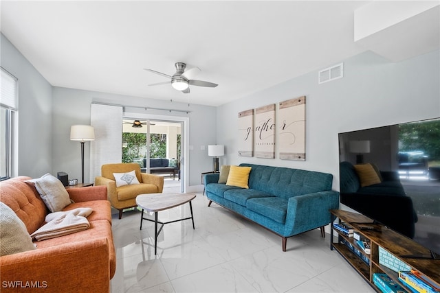 living room with ceiling fan