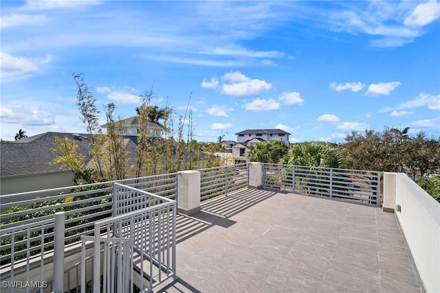 view of patio / terrace with a balcony