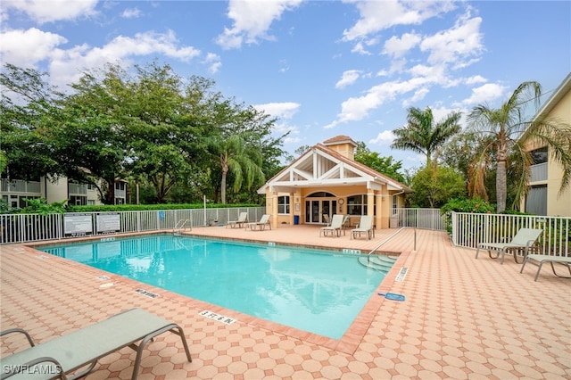 view of pool featuring a patio area