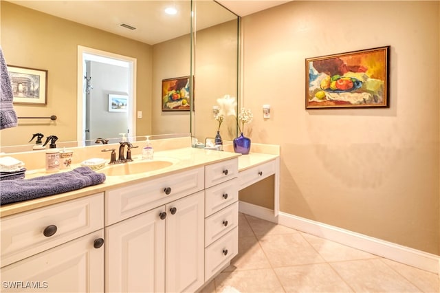 bathroom with vanity and tile patterned floors