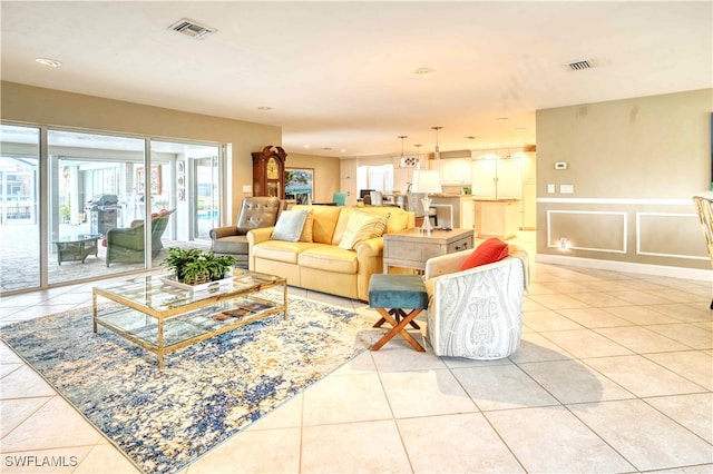 living room with light tile patterned floors