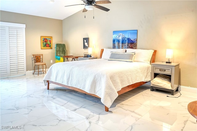 bedroom with ceiling fan and lofted ceiling