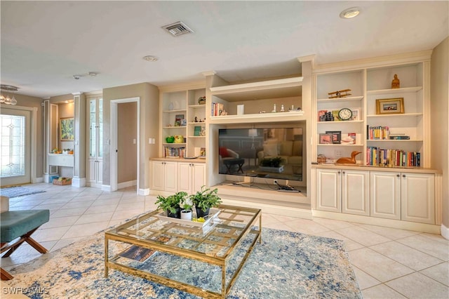 tiled living room with built in shelves