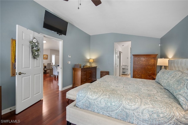 bedroom with ensuite bath, lofted ceiling, dark wood-type flooring, and ceiling fan