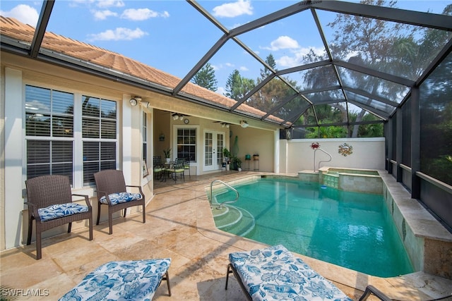 view of pool with a patio, french doors, a lanai, and ceiling fan