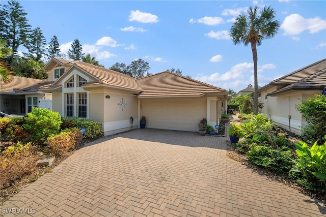 view of front of property with a garage