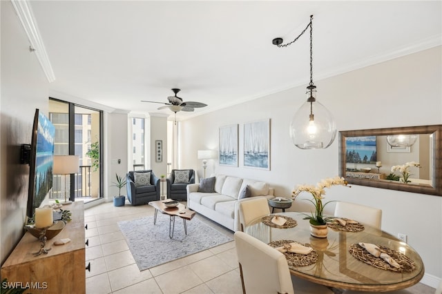 tiled living room featuring crown molding and ceiling fan