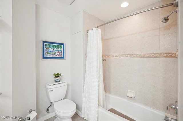 bathroom with toilet and shower / bath combination with curtain