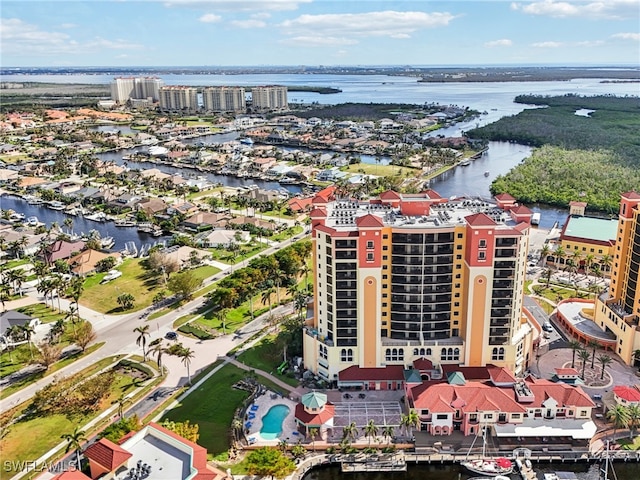 birds eye view of property featuring a water view