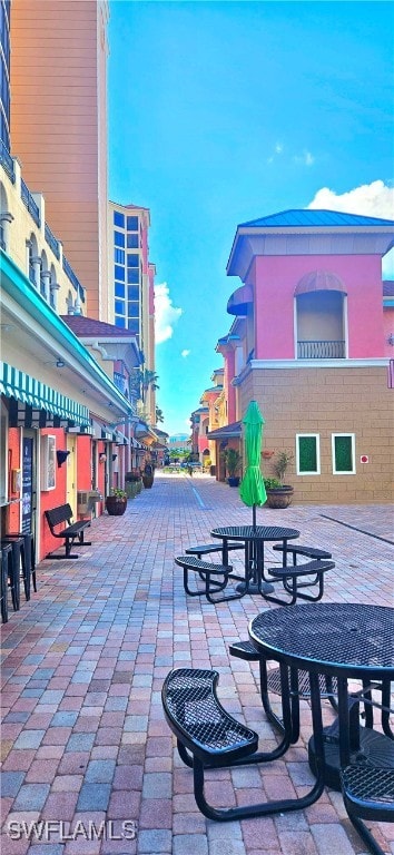 view of home's community featuring a patio area