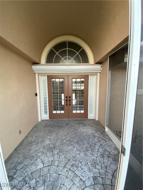 entrance to property with french doors