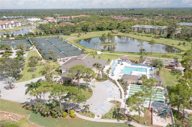 birds eye view of property with a water view