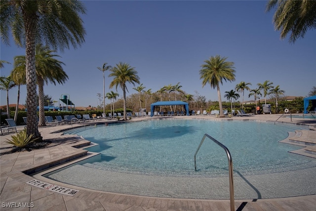 view of swimming pool with a patio area