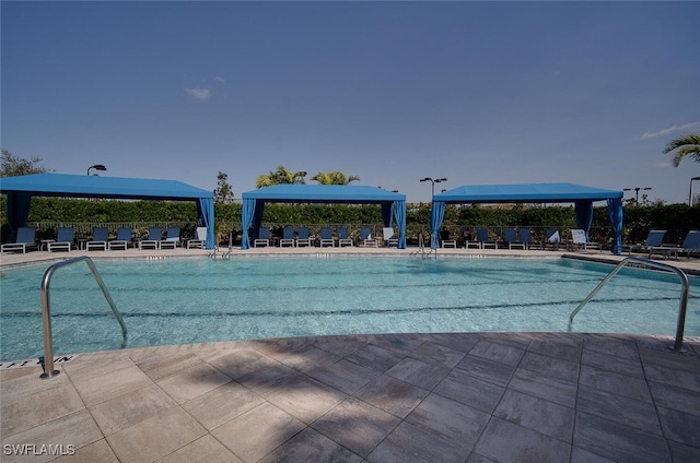 view of pool with a gazebo and a patio area