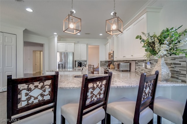 dining space featuring ornamental molding