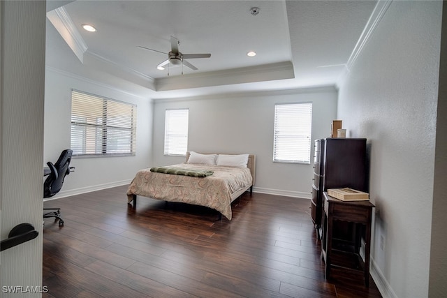 bedroom featuring multiple windows, dark hardwood / wood-style floors, crown molding, and ceiling fan