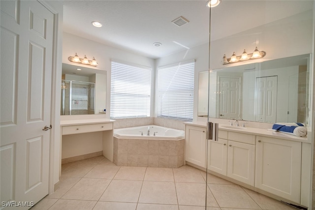 bathroom featuring vanity, separate shower and tub, and tile patterned flooring