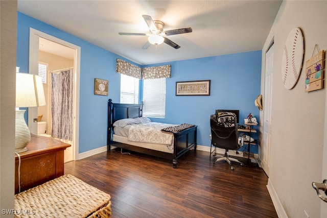 bedroom with a closet, ceiling fan, ensuite bathroom, and dark hardwood / wood-style floors