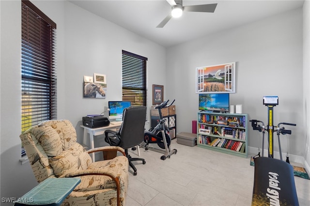 office area with ceiling fan and a wealth of natural light