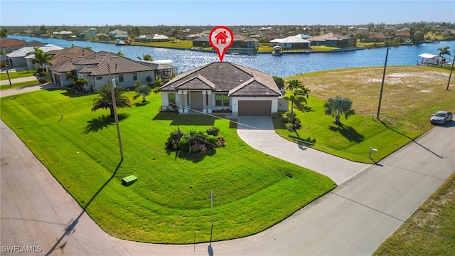 drone / aerial view with a water view