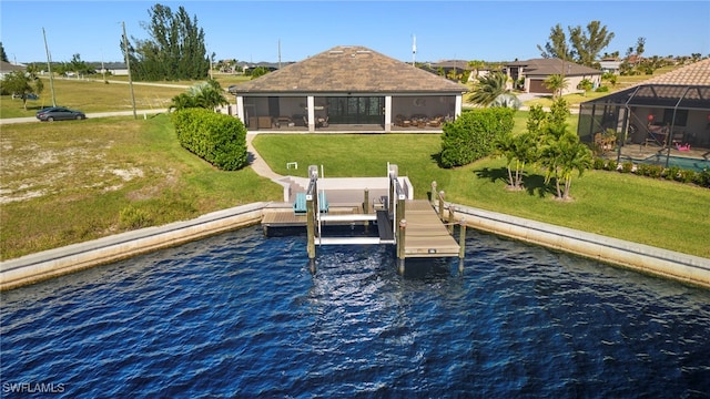 view of dock with a water view, a lanai, and a lawn