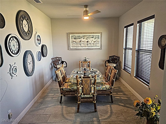 dining area with ceiling fan