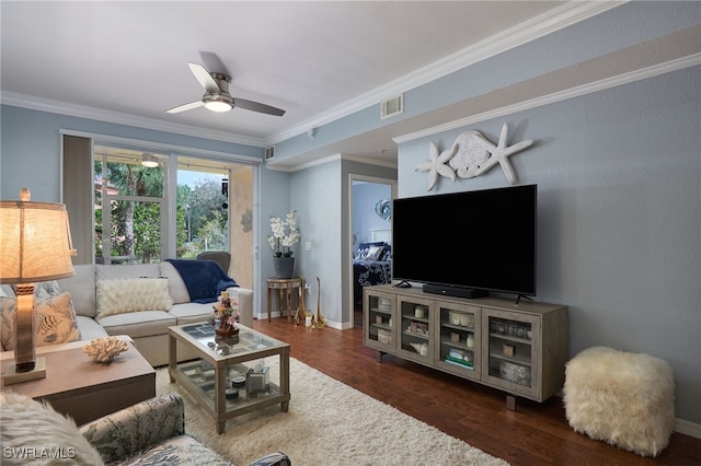 living room with ceiling fan, ornamental molding, and dark hardwood / wood-style floors