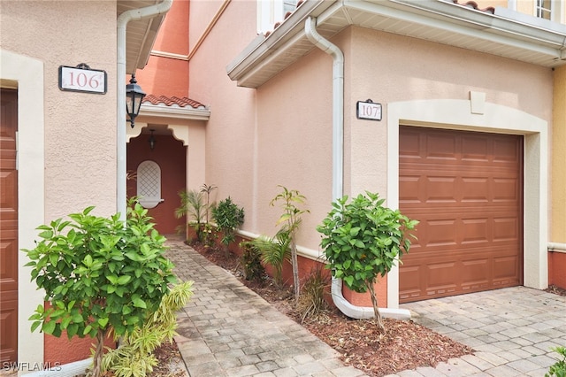 property entrance featuring a garage