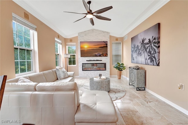 living room with crown molding, a fireplace, ceiling fan, and lofted ceiling