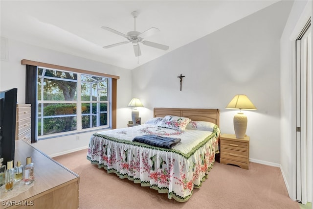 bedroom featuring ceiling fan and light carpet