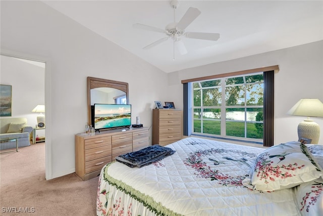 bedroom with lofted ceiling, carpet floors, and ceiling fan