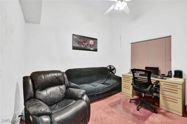 carpeted office featuring ceiling fan