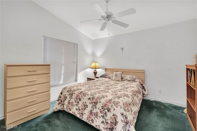 carpeted bedroom with vaulted ceiling and ceiling fan