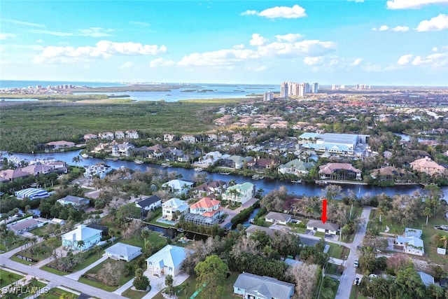 drone / aerial view featuring a water view