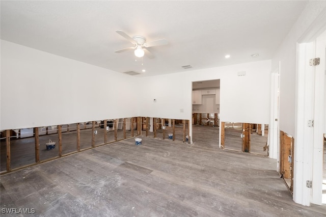 unfurnished room featuring ceiling fan and wood-type flooring