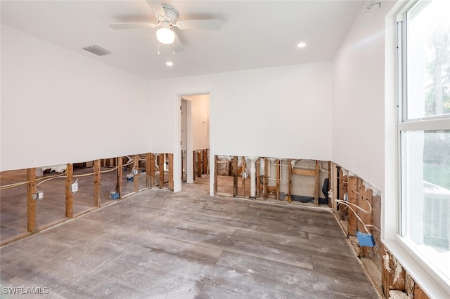 unfurnished room featuring ceiling fan and hardwood / wood-style floors