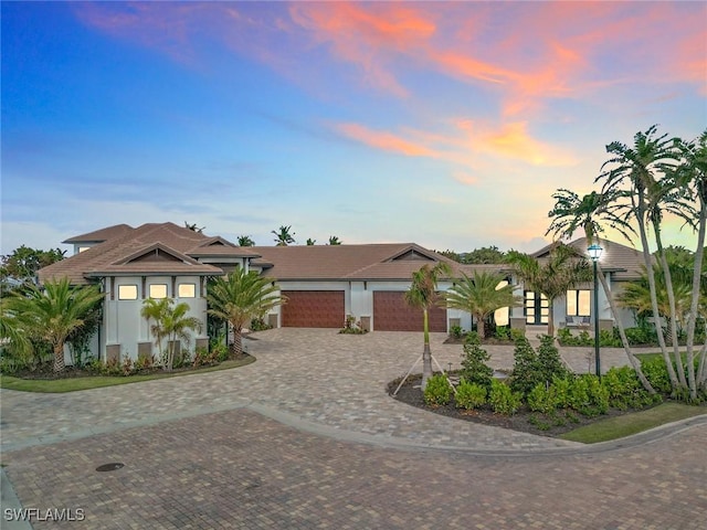 view of front of home with a garage