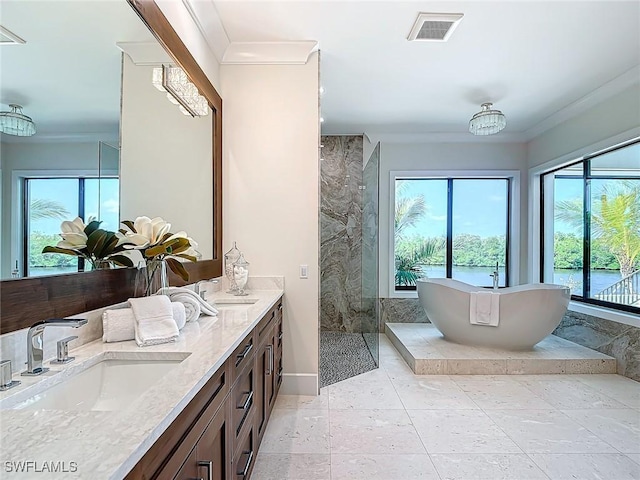 bathroom with vanity, shower with separate bathtub, and crown molding