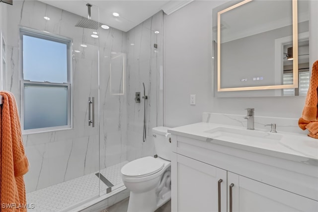 bathroom featuring toilet, an enclosed shower, vanity, and crown molding