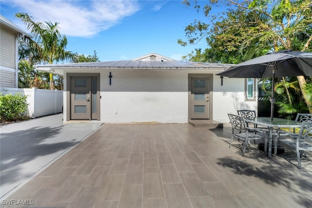 rear view of house featuring a patio area