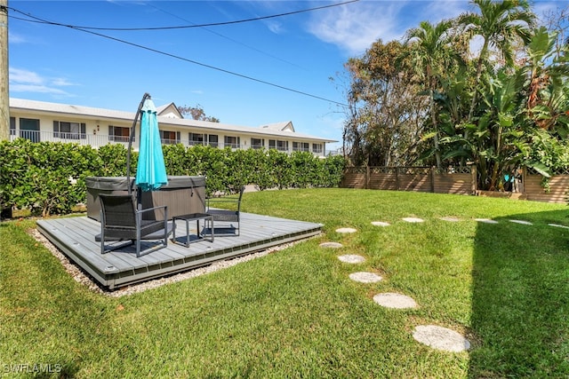 view of yard featuring a wooden deck