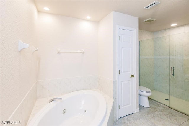 bathroom featuring toilet, separate shower and tub, and tile patterned flooring