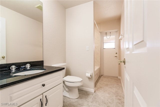 full bathroom featuring vanity, toilet, tile patterned flooring, and tub / shower combination