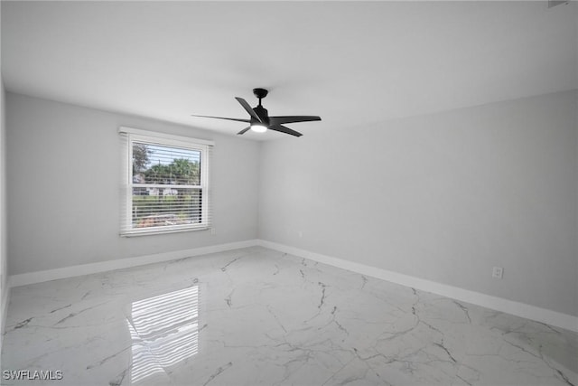 spare room featuring ceiling fan