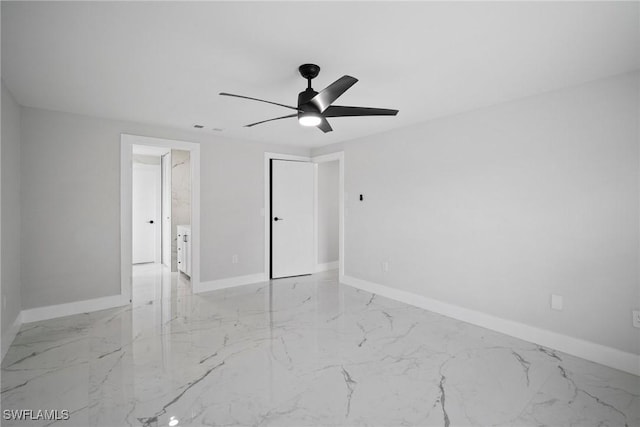 unfurnished room with ceiling fan