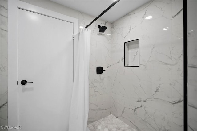 bathroom with curtained shower