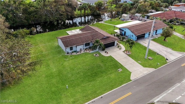 drone / aerial view featuring a water view