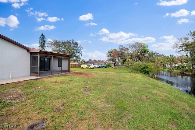 view of yard featuring a water view